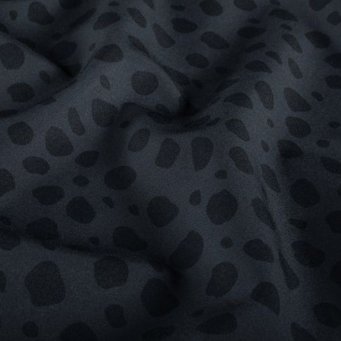 Tissu Softshell  Naya léopard Noir sur fond Gris