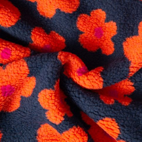 Tissu Sherpa Elya  Fleurs oranges sur fond Bleu foncé