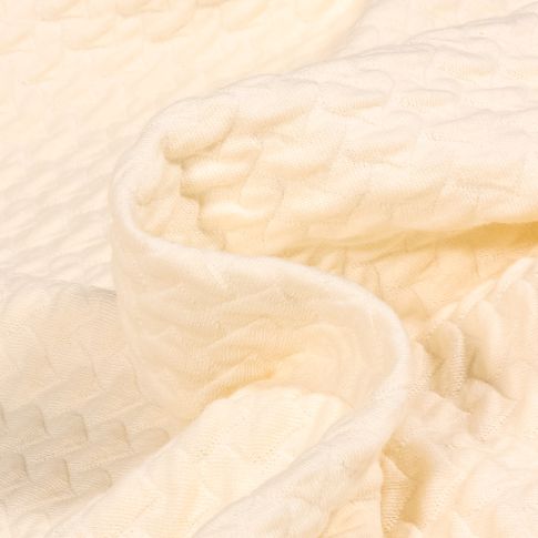 Tissu Sweat matelassé léger Coeurs 3D sur fond Ecru