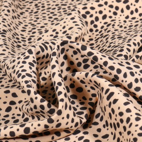 Tissu Polyester Stretch Mini Dalma sur fond Beige