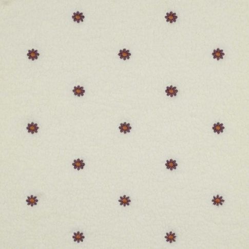 Tissu Fausse fourrure Bouclettes Fleurs brodées sur fond Ecru