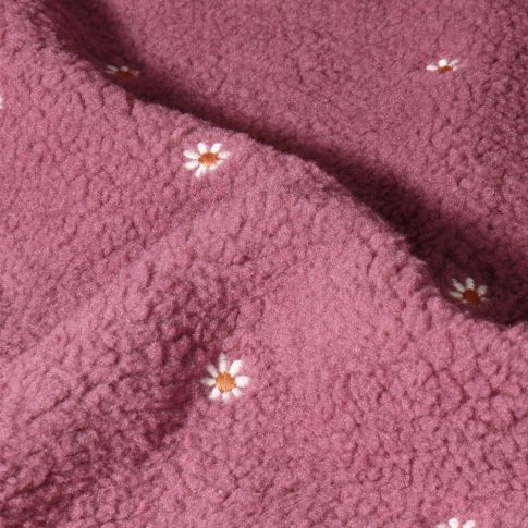 Tissu Fausse fourrure Teddy Bouclettes Fleurs brodées sur fond Rose