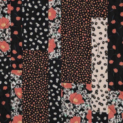 Tissu Matelassé réversible motif Patchwork fleuris sur fond Noir