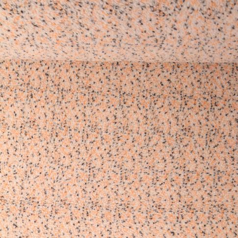 Tissu Fausse fourrure Mouton Toundra moucheté Orange et Noir sur fond Beige