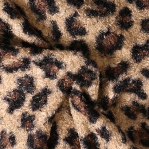 Tissu Fausse fourrure Bouclette Yara motif léopard Chocolat sur fond Beige sable