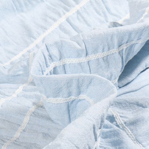 Tissu Voile de Coton smocké brodé uni Bleu ciel