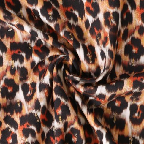Tissu Viscose Lurex Féline taches fauves et noirs sur fond Blanc