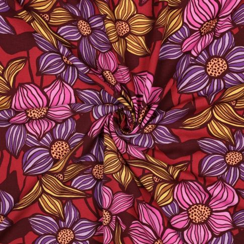 Tissu Viscose EcoVero tapis fleurs Rose, Violet et Rouge sur fond Bordeaux