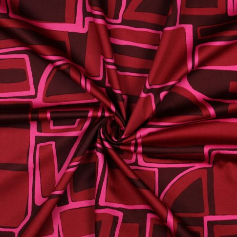 Tissu Coton satiné motifs géométrique sur fond Bordeaux