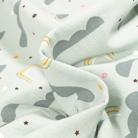 Tissu Coton lavé Nuage et arc en ciel sur fond Vert menthe
