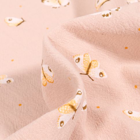 Tissu Coton lavé Papillons colorés sur fond Rose nude