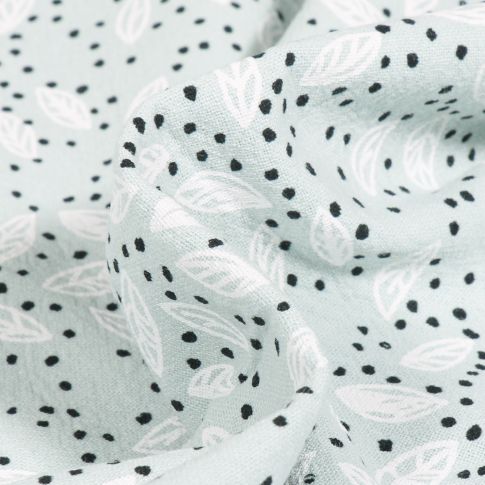 Tissu Coton lavé Feuilles et pois sur fond Vert menthe clair