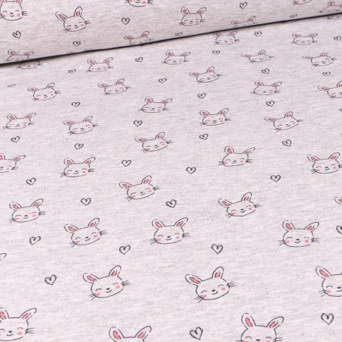 Tissu Sweat envers minky Têtes de lapins et coeurs sur fond Gris chiné