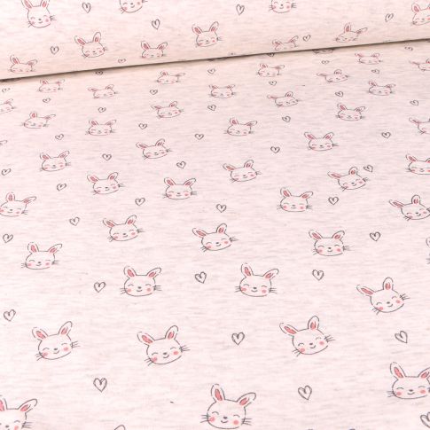Tissu Sweat envers minky Têtes de lapins et coeurs sur fond Beige chiné
