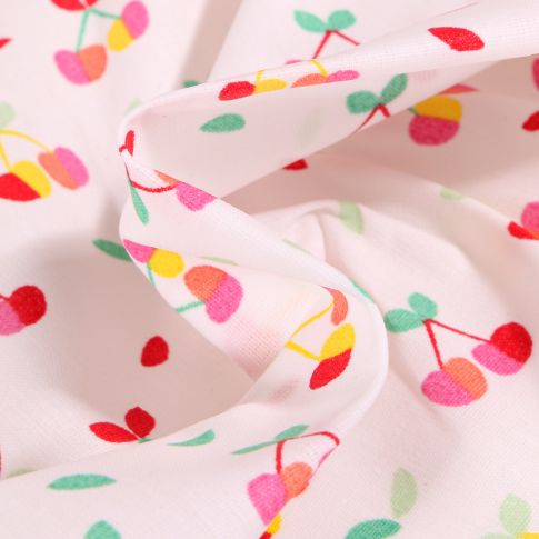 Tissu Coton enduit Cerises multicolores sur fond Blanc