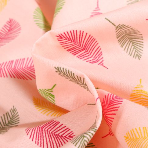 Tissu Coton enduit Feuilles multicolores sur fond Rose