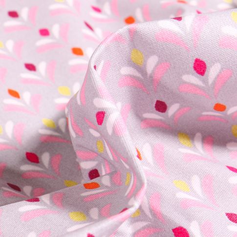 Tissu Coton enduit Pétales multicolores sur fond Gris clair