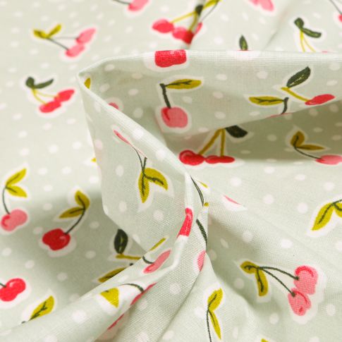 Tissu Coton enduit Cerises et pois sur fond Vert menthe clair