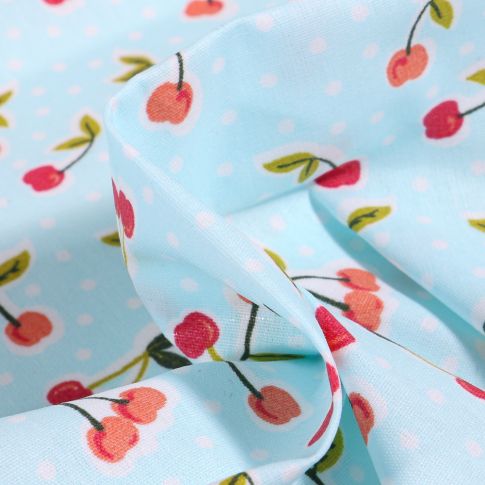 Tissu Coton enduit Cerises et pois sur fond Bleu