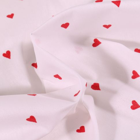 Tissu Coton enduit Petits cœurs rouges sur fond Blanc