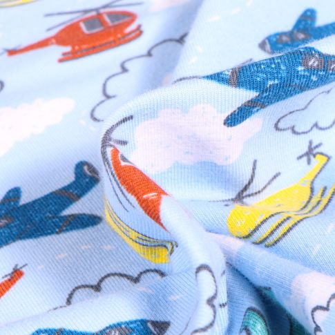 Tissu Jersey Coton Hélicoptère sur fond Bleu ciel
