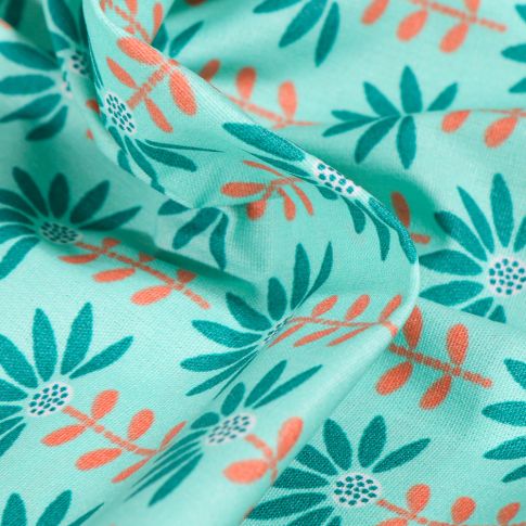 Tissu Coton enduit Pâquerettes sur fond Bleu lagon