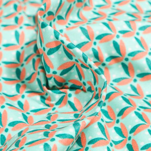 Tissu Coton enduit Pétales et pois sur fond Vert menthe clair