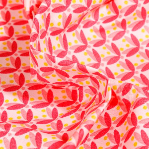 Tissu Coton enduit Pétales et pois rose sur fond Blanc