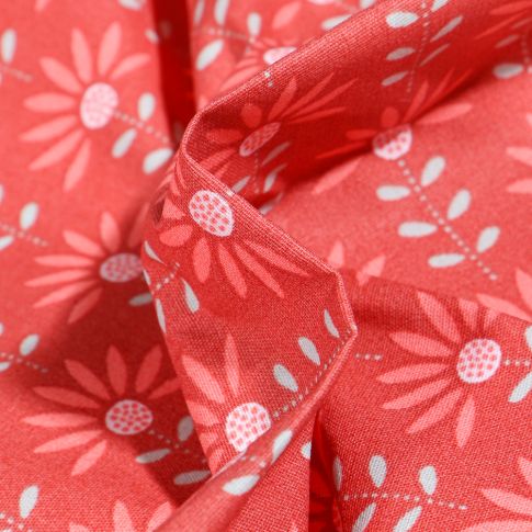 Tissu Coton enduit Pâquerettes sur fond Rouge
