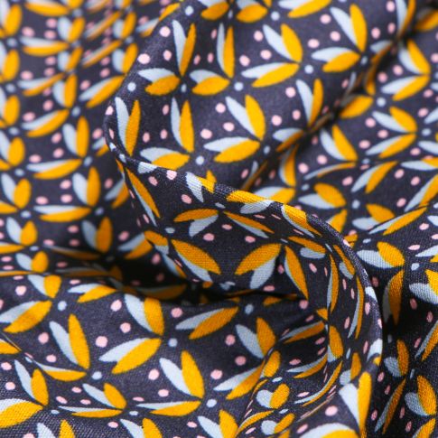 Tissu Coton enduit Pétales et pois jaunes sur fond Bleu nuit