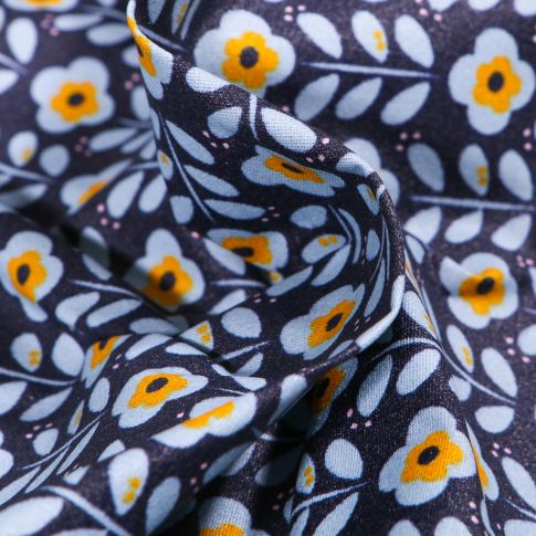 Tissu Coton enduit Fleurs seventies ciel et jaune sur fond Bleu nuit