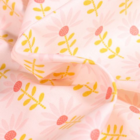Tissu Coton enduit Pâquerettes rose et jaune sur fond Blanc
