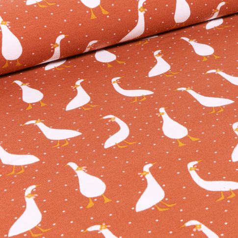 Tissu Jersey Coton Bio Oies coquettes sur fond Brique