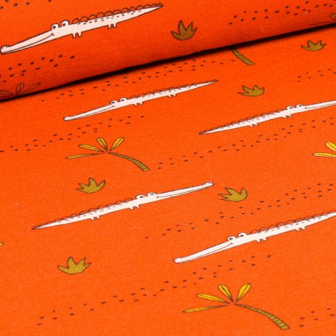 Tissu Jersey Coton Bio Crocodile et palmier sur fond Orange