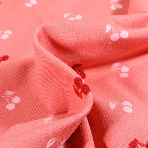 Tissu Jersey Coton Cerises sur fond Corail