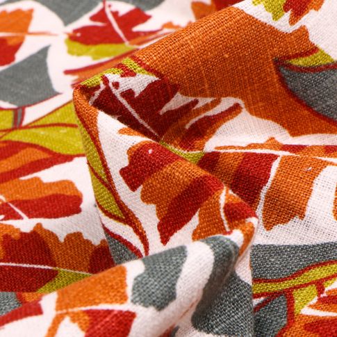 Tissu Lin Feuilles colorées orange sur fond Blanc
