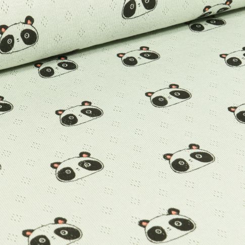 Tissu Jersey ajouré  Têtes de Pandas sur fond Vert pastel