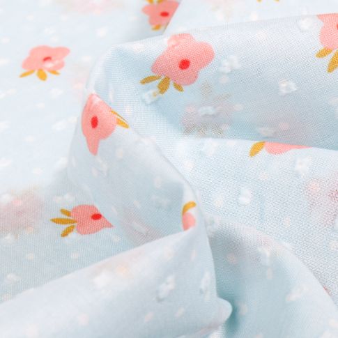 Tissu Plumetis Coton Fleurs colorées sur fond Bleu ciel