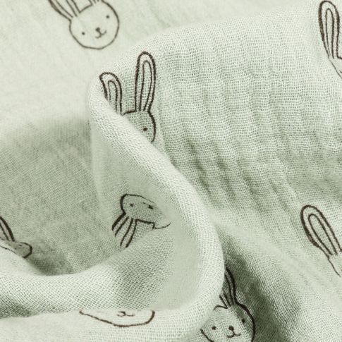 Tissu Double gaze Bio Têtes de lapins sur fond Vert d'eau