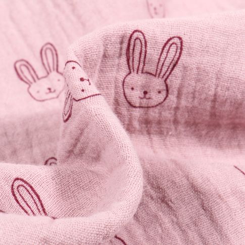 Tissu Double gaze Bio Têtes de lapins sur fond Rose