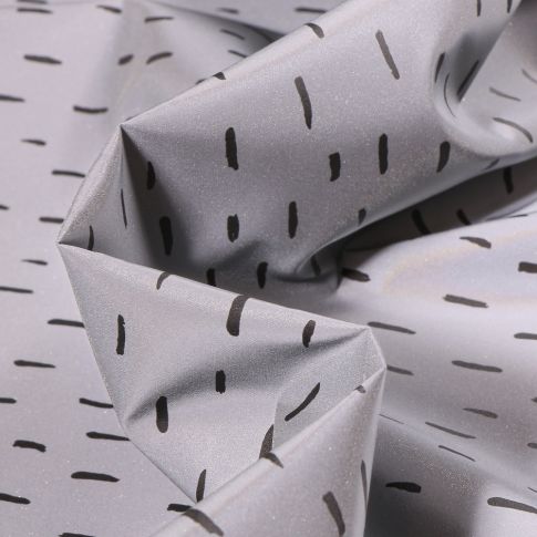 Tissu Imperméable réfléchissant Pointillés noir sur fond Gris