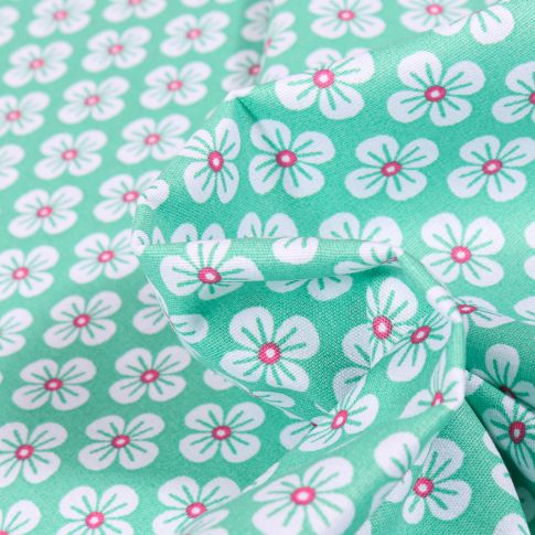 Tissu Coton imprimé Violette blanches sur fond Vert menthe