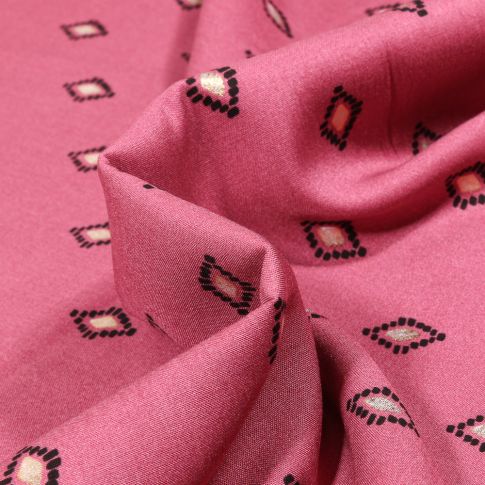 Tissu Viscose Losanges ethniques dorés sur fond Rose