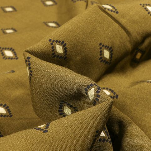 Tissu Viscose Losanges ethniques dorés sur fond Vert kaki