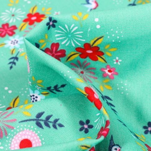 Tissu Coton imprimé Fleurs estivales sur fond Vert menthe