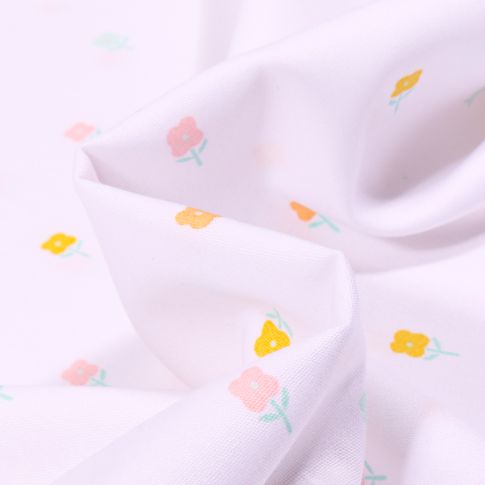 Tissu Coton imprimé LittleBird Arc en ciel pastel sur fond Blanc