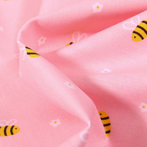 Tissu Coton imprimé Abeille et petites fleurs sur fond Rose pâle
