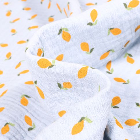 Tissu Double gaze Bio Citrons sur fond Bleu ciel