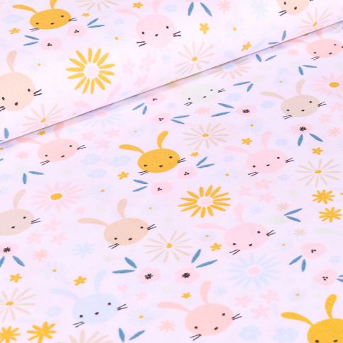 Tissu Coton imprimé Têtes lapinou sur fond Blanc