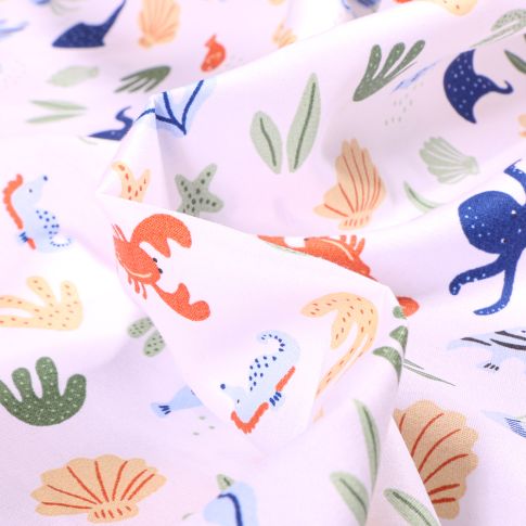 Tissu Coton imprimé Pieuvres et coquillages sur fond Blanc